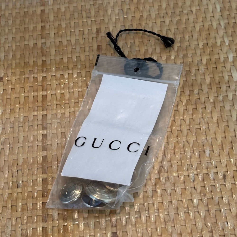 Gucci set of 4 silver tone buttons new!  Two small and two larger ones!